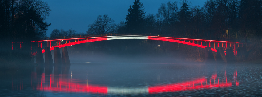 Ogre Arkveida tilts izgaismots